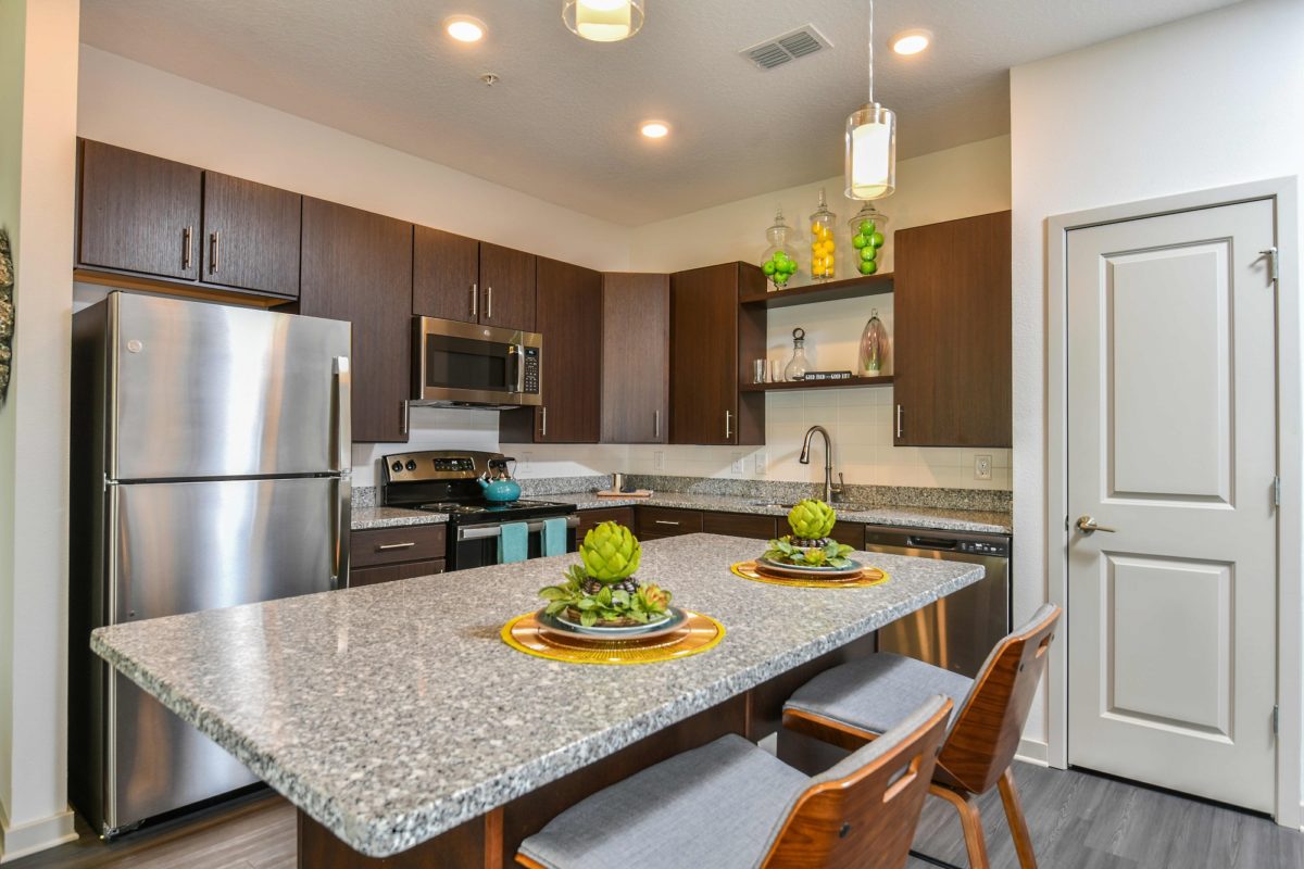 Kitchen with granite counters and stainless steel appliances